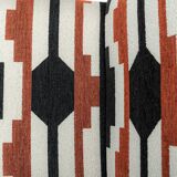 Pair of armchairs with bold geometric upholstery