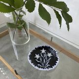 Black ceramic plate from the 60s