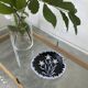 Black ceramic plate from the 60s