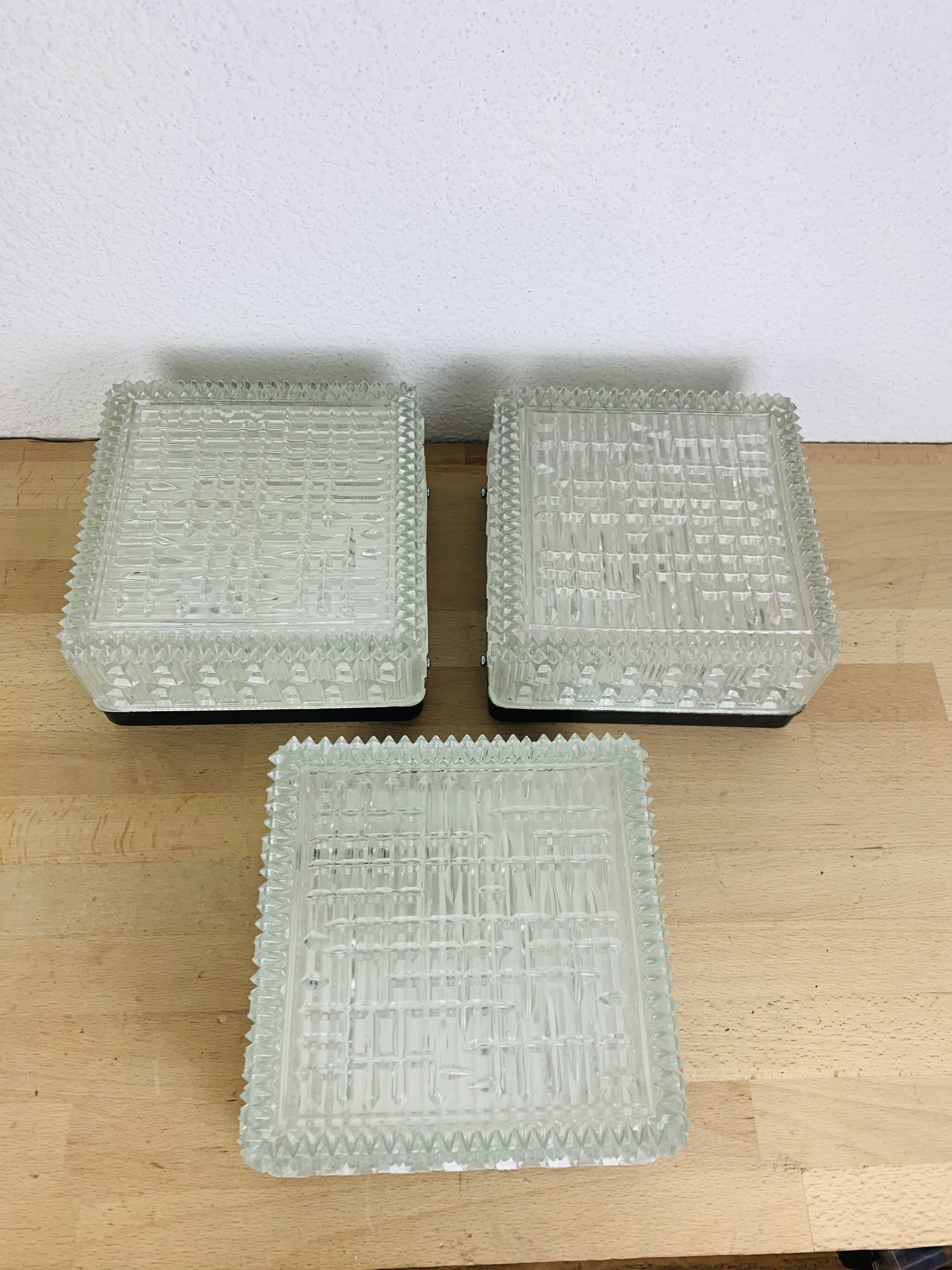 3 square wall lights in chiseled molded glass from the 50s, Holophane