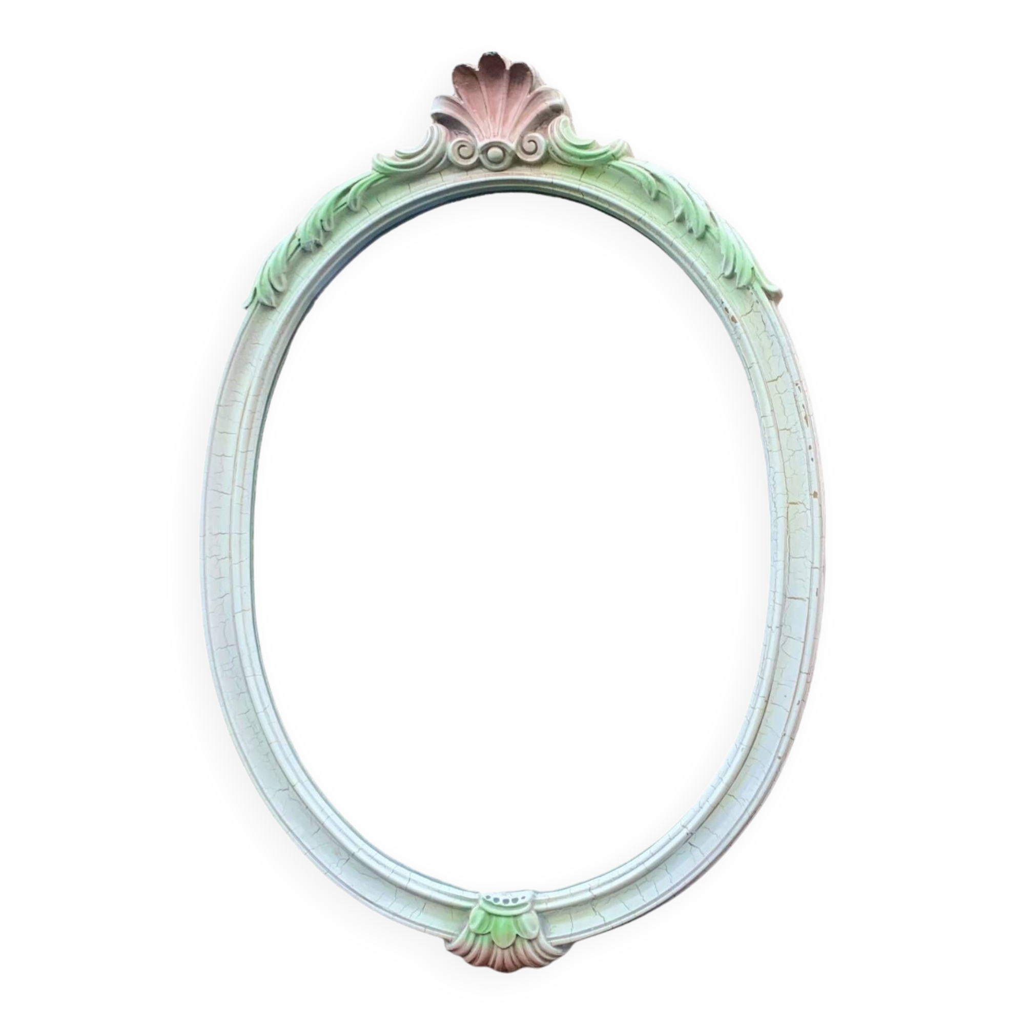 Vintage oval mirror in carved wood in pastel tones