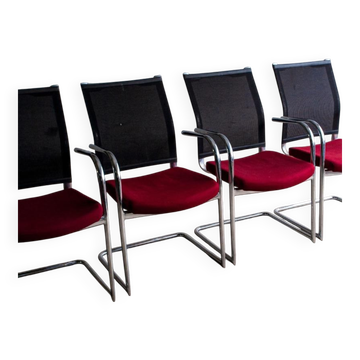 Set of 4 cantilever chairs with burgundy seat and mesh backrest.