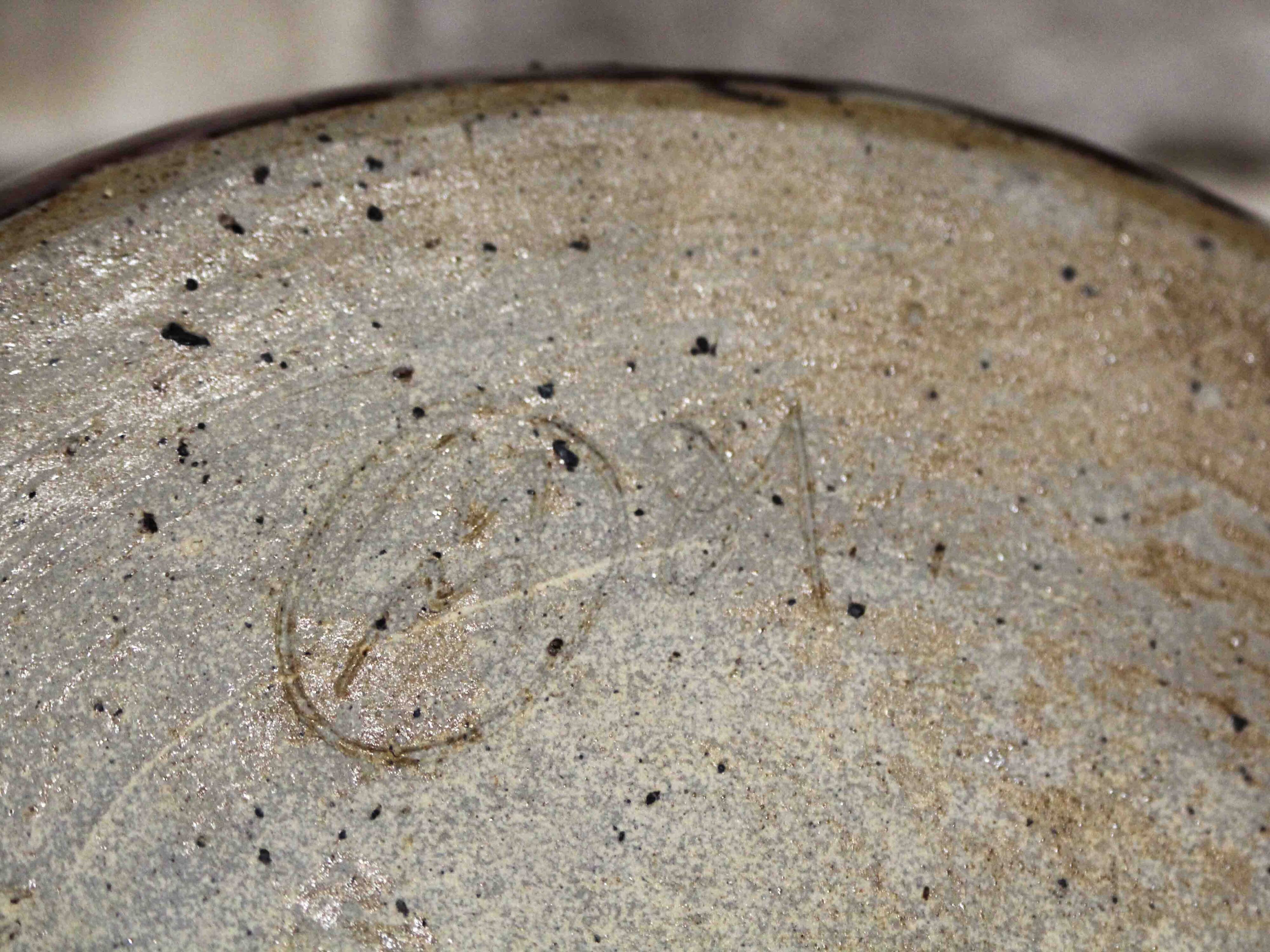 Large decorative plate in glazed stoneware, signed.