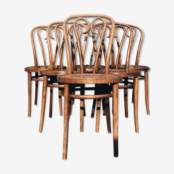 Six patinated bistro chairs