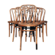 Six patinated bistro chairs