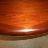 Expandable round teak table