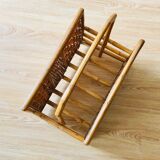 Vintage rattan magazine holder with floral decoration