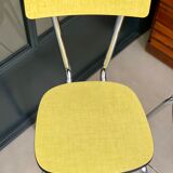 Pair of yellow formica chairs