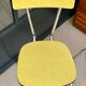 Pair of yellow formica chairs