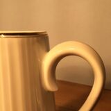 White pitcher streaked