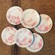 6 vintage pink Shabby dessert plates seen from the east