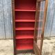 Art deco oak display cabinet with 1 glass door.