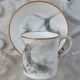 Tasse et sous tasse décor en grisaille Porcelaine de Paris XIXème signée décor moulin