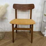 Scandinavian chair with mustard yellow fabric