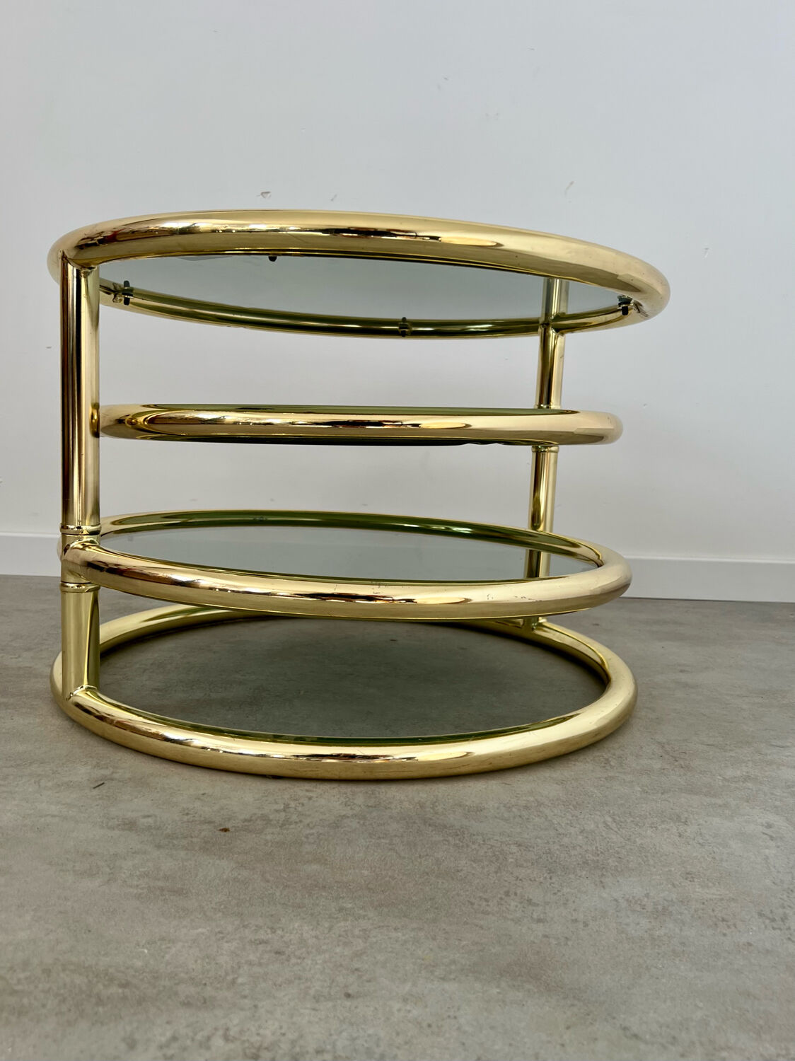Three-level swivel coffee table in morex design brass Milo Baughman italy