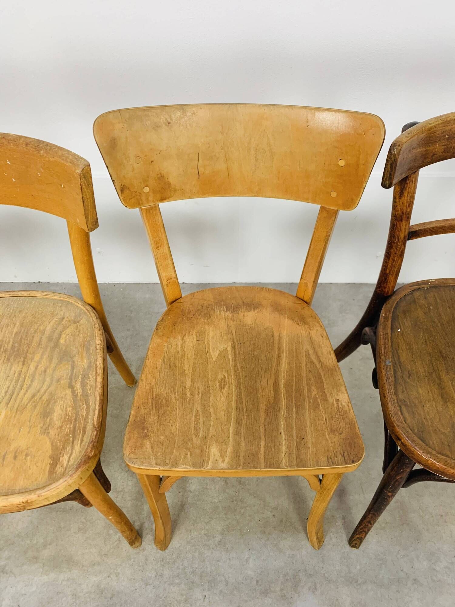 6 mismatched Baumann & Luterma bistro chairs, wood, 1960s
