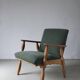 Henning Kjaernulf oak scalloped lounge chair | Denmark | 1950s