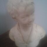 Boy bust in plaster