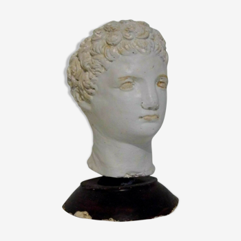 Ancient bust in Roman Greco patinated plaster.