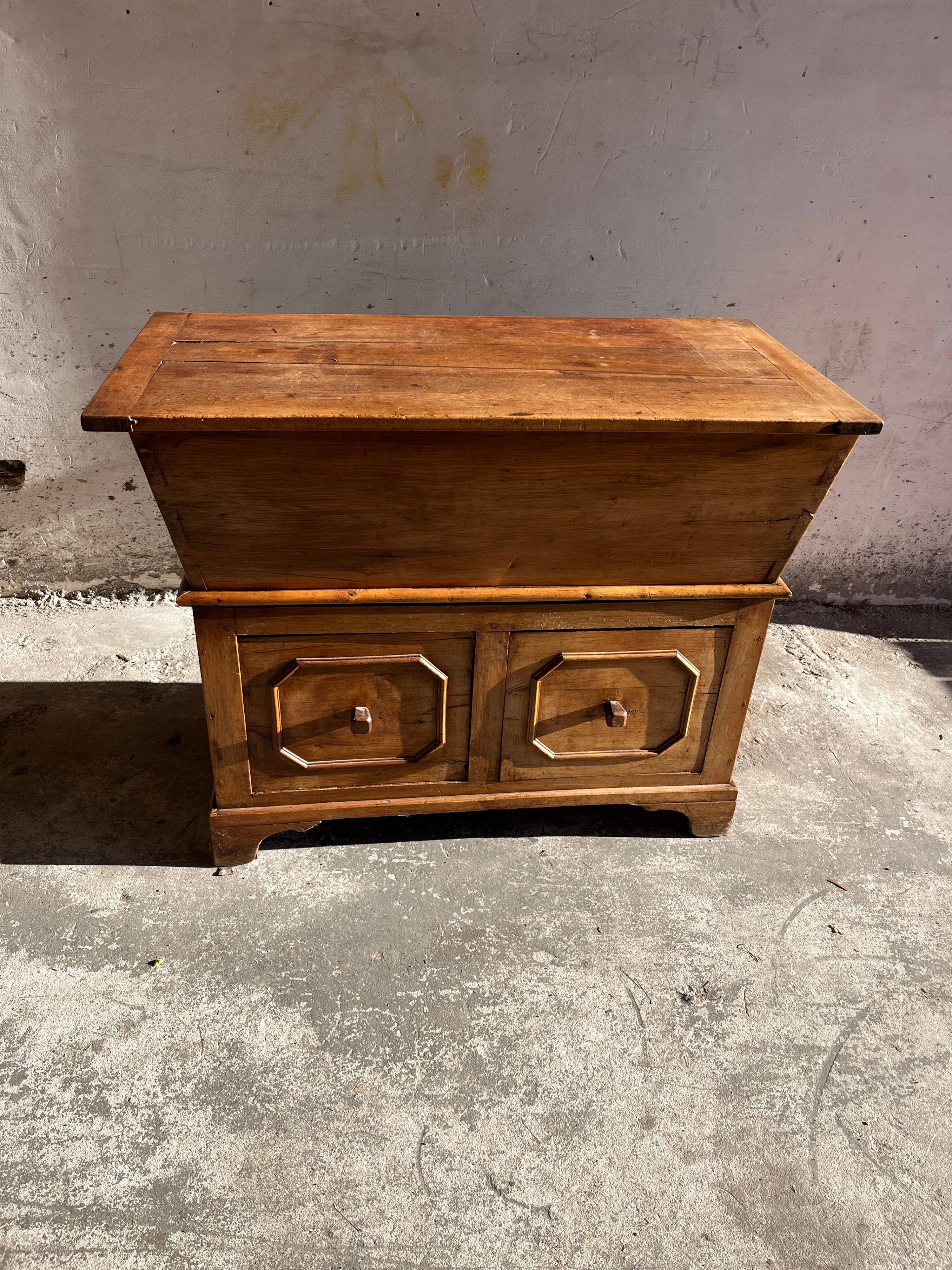 Old wooden baker's chest with storage drawers