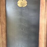 Vintage wooden wardrobe with matte cast iron color hanging rail