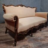 Carved walnut canapé – Louis XV style – 20th century