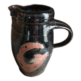 Ceramic pitcher. Belly shape. Motives on both sides