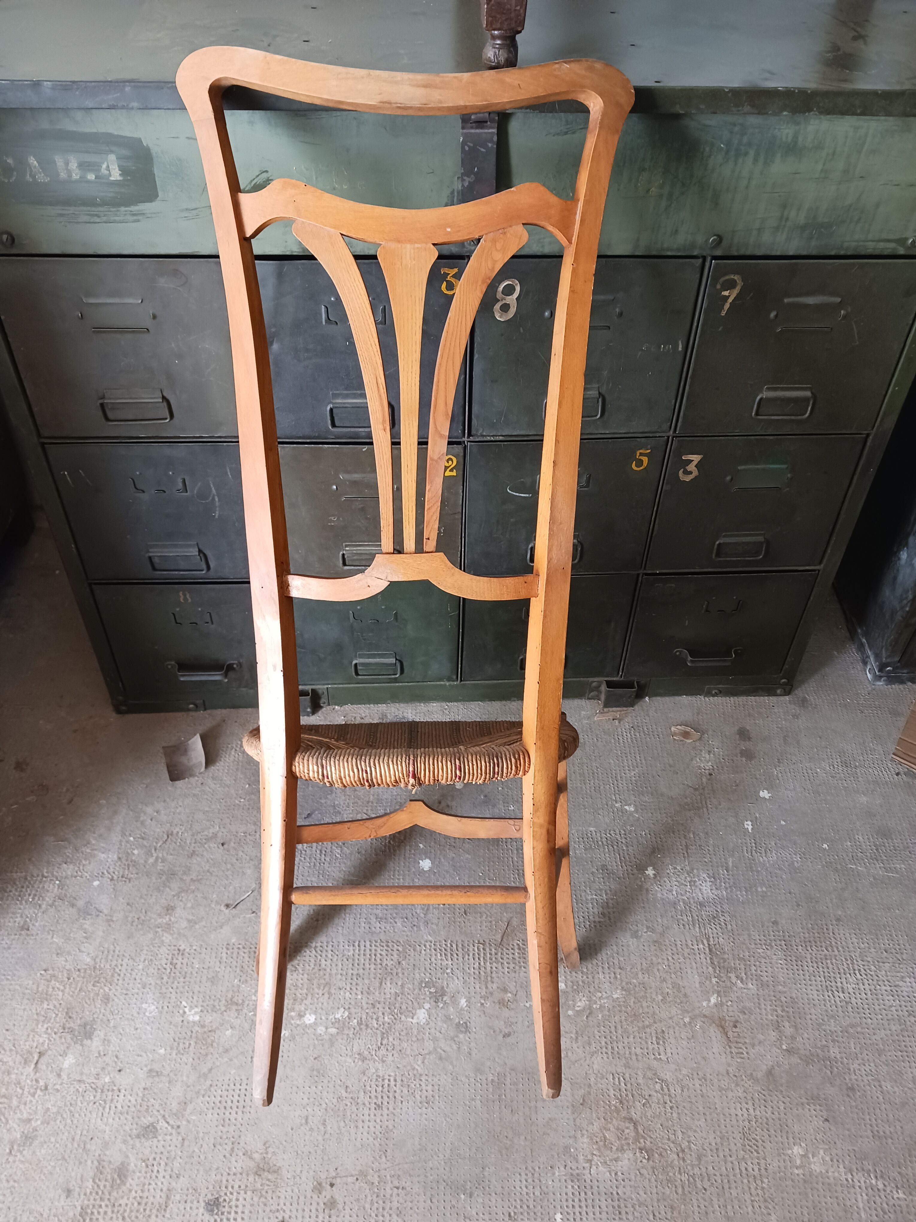 Low chair with high back, called nourishment period 1900, Art Nouveau