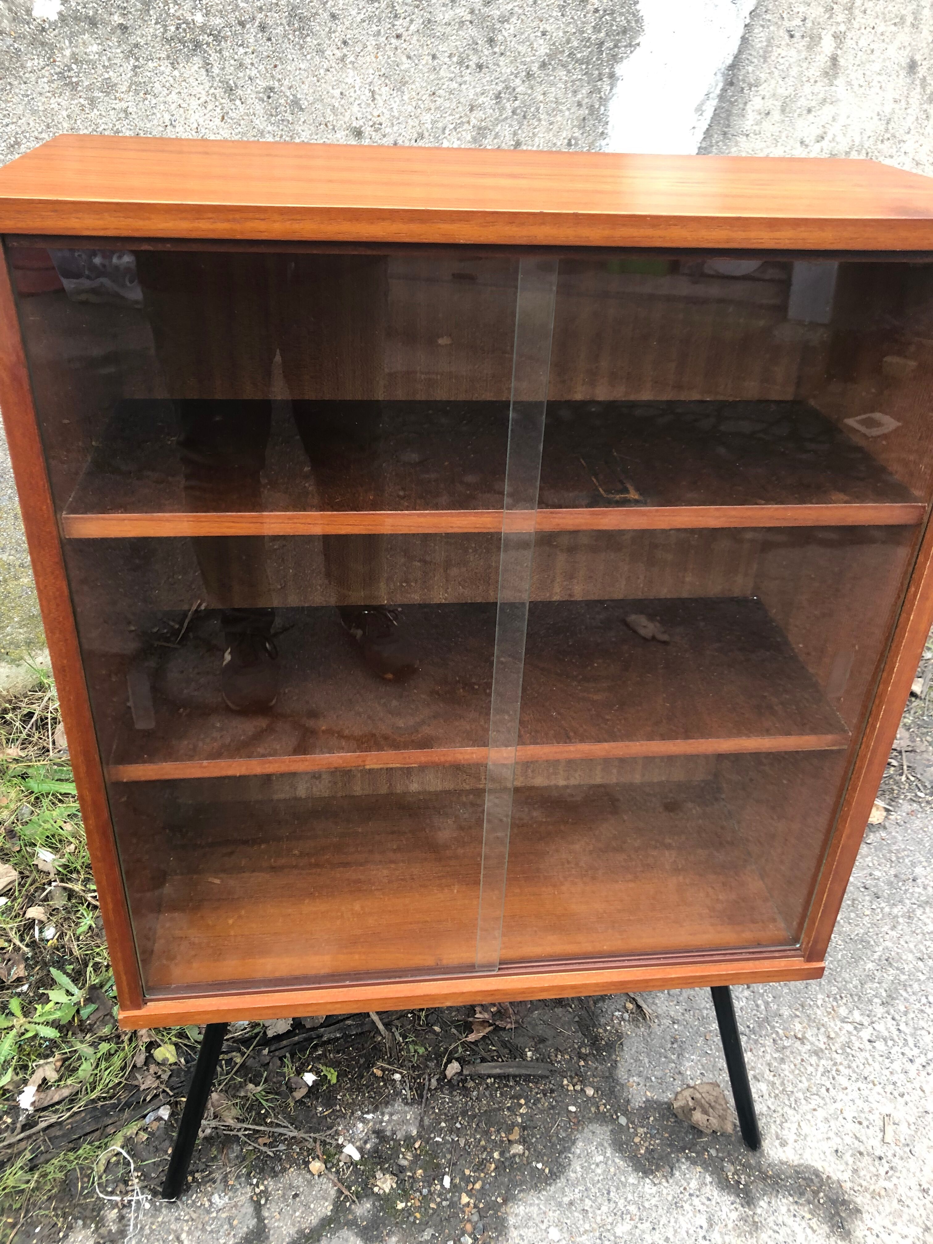 Vintage library showcase with 60s sliding doors