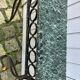 Console in wrought and hammered iron and green marble