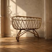 Vintage rattan and wicker cradle on legs, 1970s, Europe
