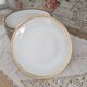 Lot de 12 assiettes plates en porcelaine blanche Euro Porcelaine frise dorée