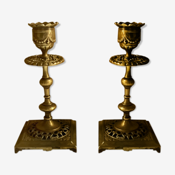 Pair of candlesticks in gilded bronze