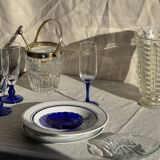 Small golden glass ice bucket with diamond point design and its scoop.