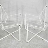 Paire de fauteuils tiges d'acier laqués blanc. Circa 1985
