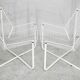 Paire de fauteuils tiges d'acier laqués blanc. Circa 1985