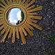 Mid-century style gold resin witch's eye sunburst mirror