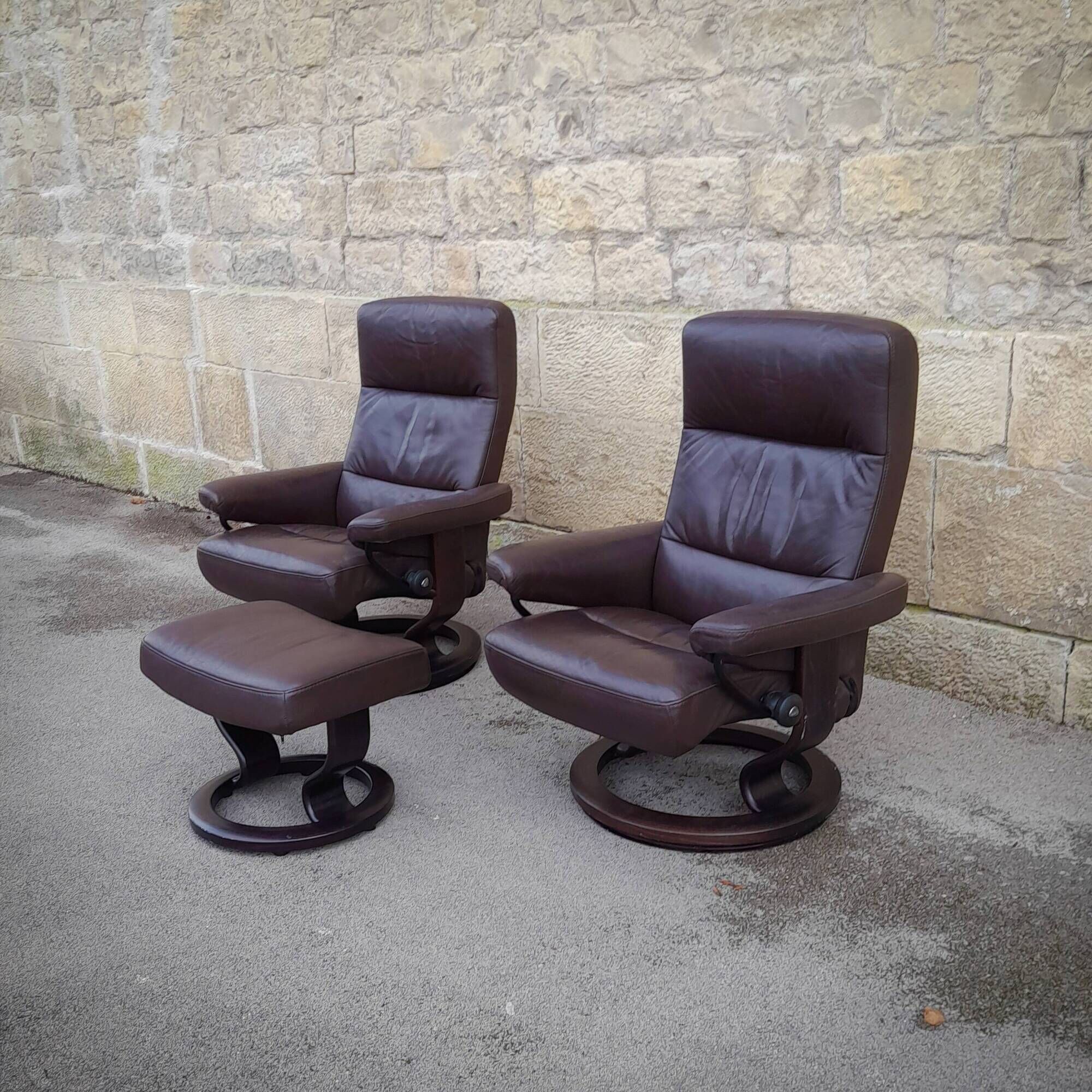 Pair of Scandinavian leather armchairs and ottoman, Ekornes, Norway, 1970