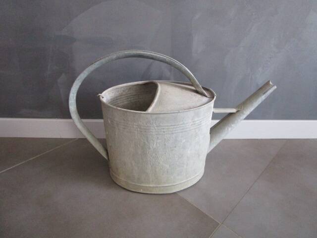 Old zinc watering can
