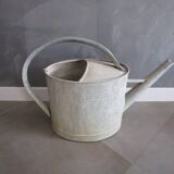 Old zinc watering can