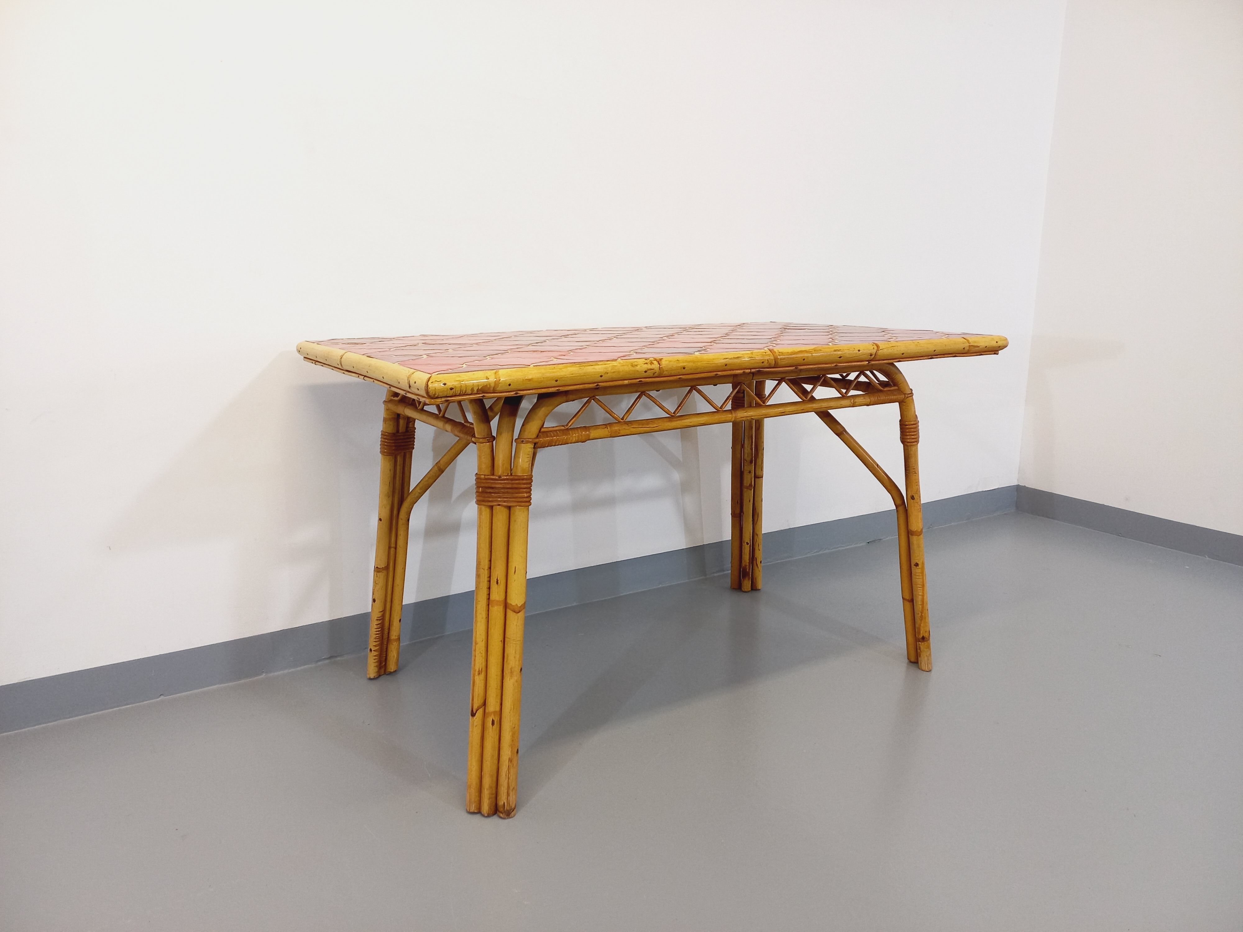 Vintage dining table in rattan and ceramic from Vallauris from the 50s and 60s