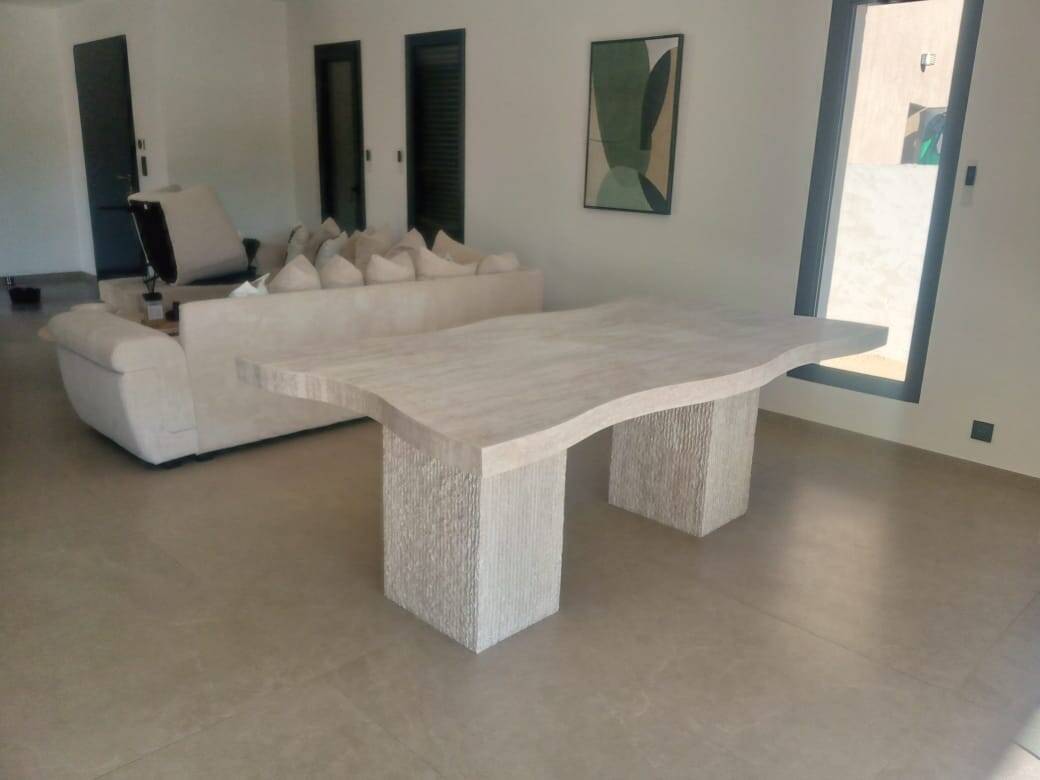 Dining table in travertine