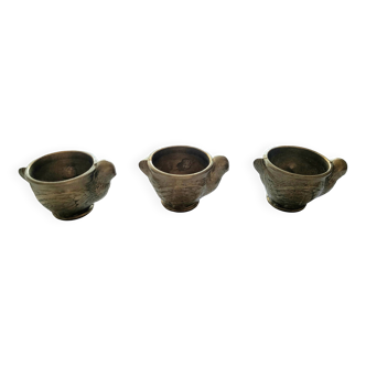 3 brass egg cups in the shape of a hen
