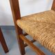 Suite de 2 fauteuils brutalistes vintage en bois de chêne et paille