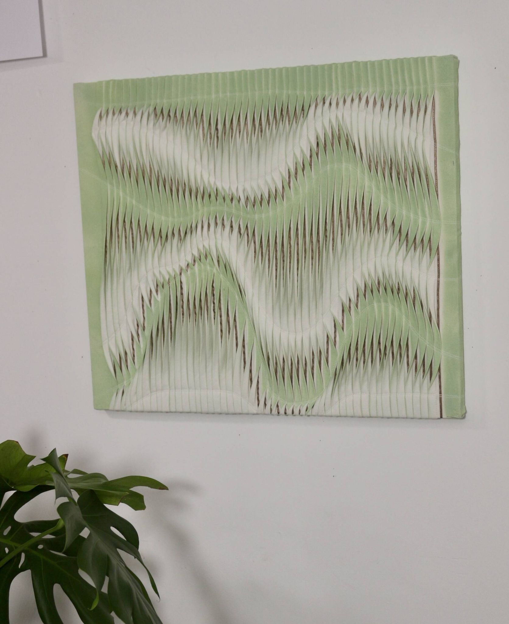 Textured wave effect painting by pleating in light green color. Contemporary. Ref Riviera