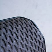 Vitra ID Trim office chair by Antonio Citterio — black mesh backrest and blue fabric seat, aluminium frame.