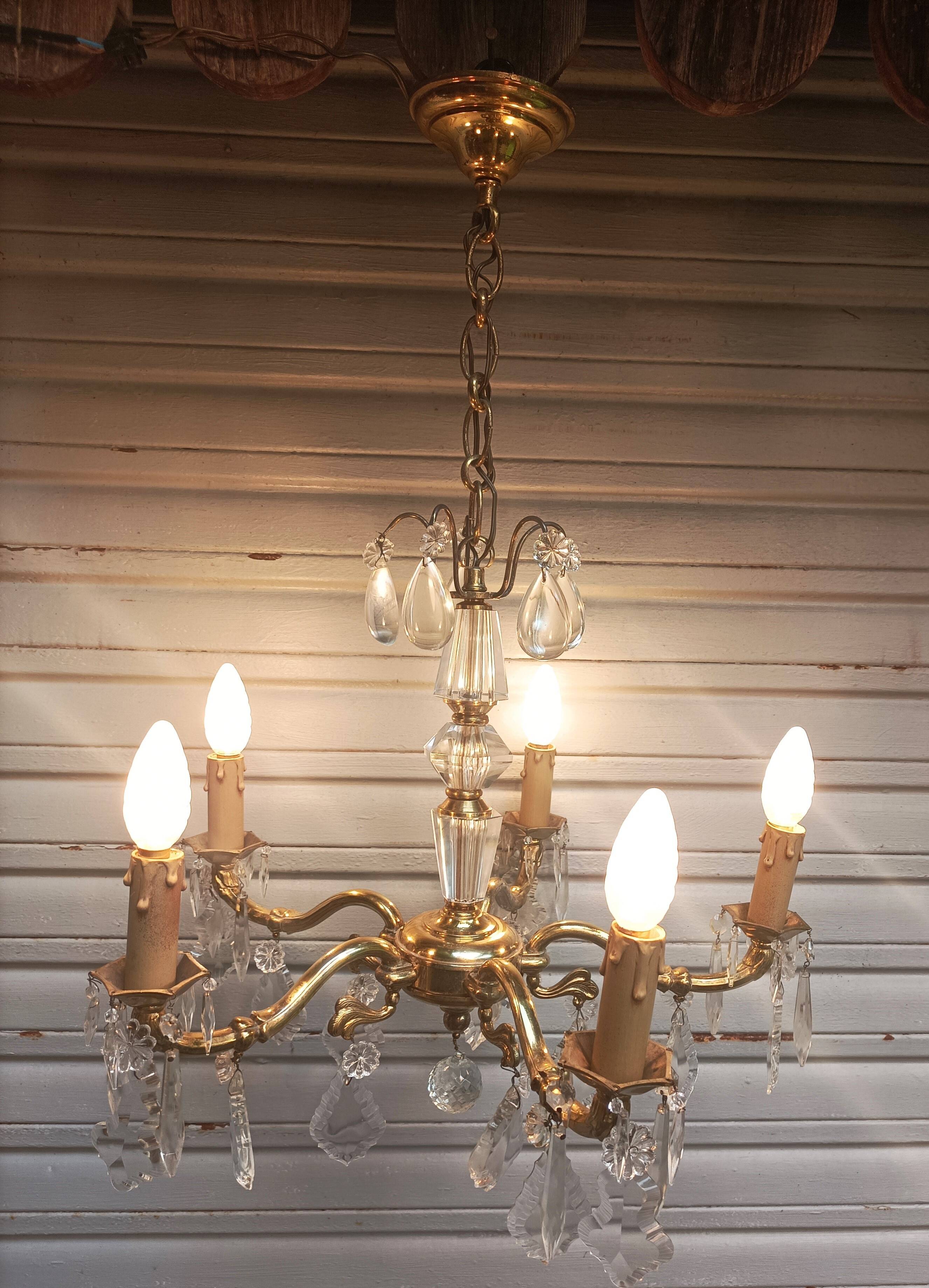Exceptional bronze chandelier with crystal pendants in working order circa 1910