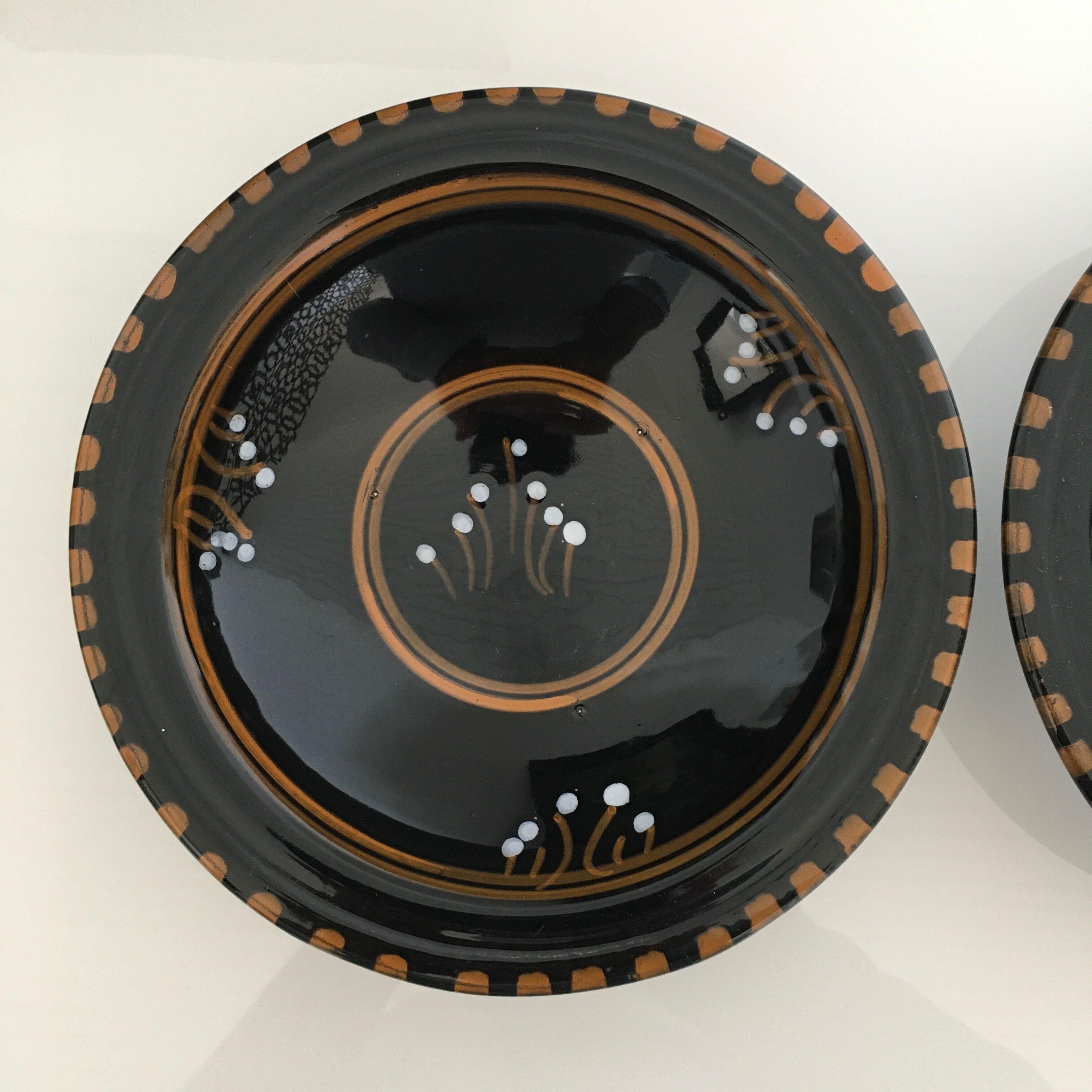 Set of 3 black decorative deep plates.