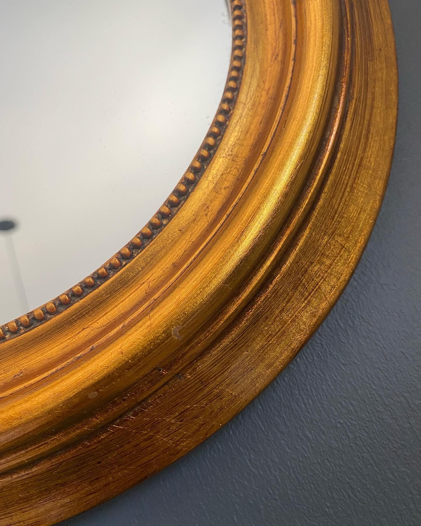 Vintage round gold mirror