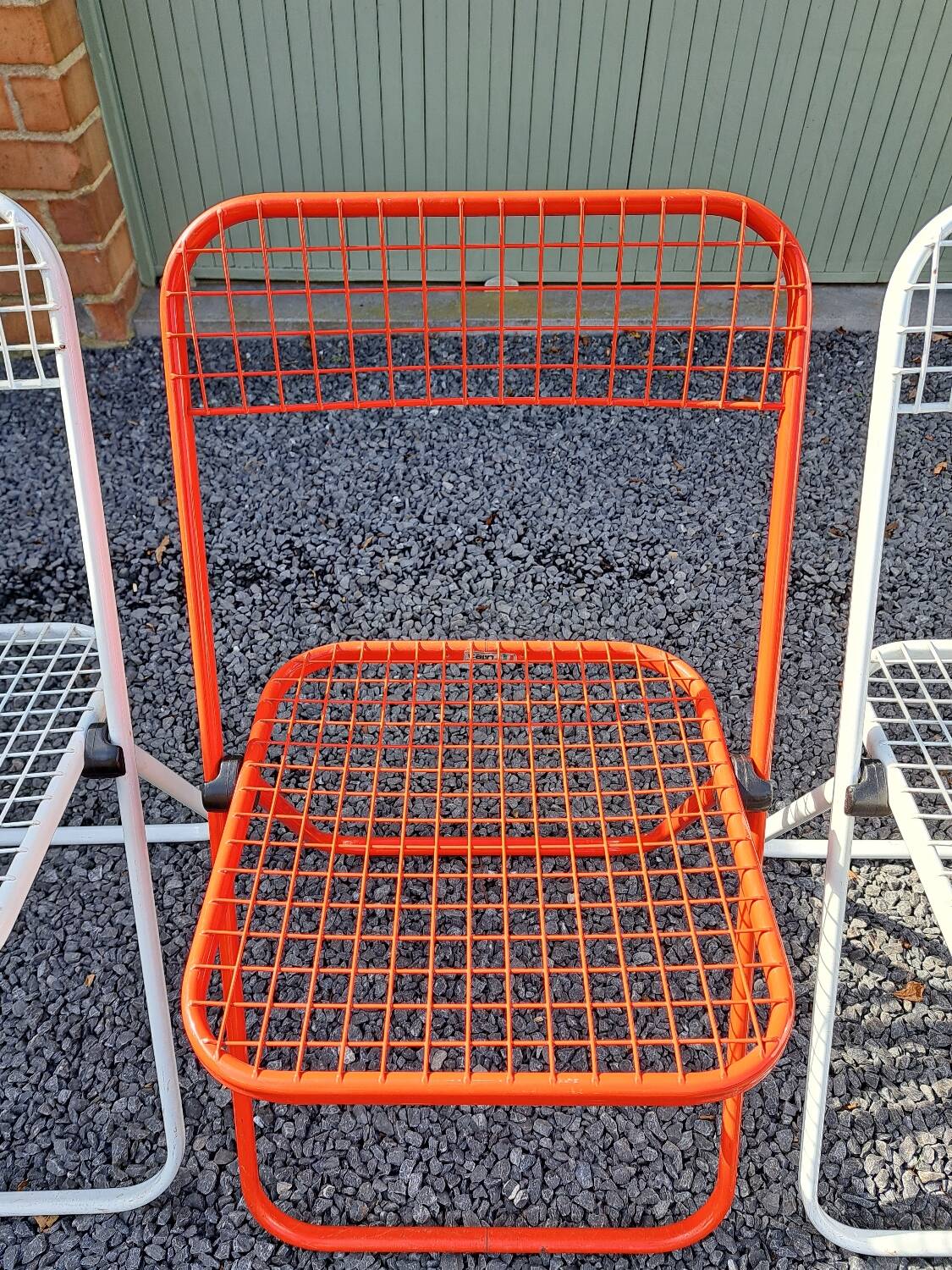 Series of 5 Talin folding metal chairs